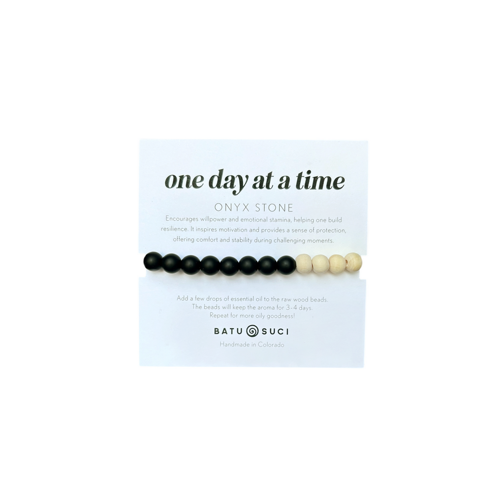 Infused with intention, this bracelet doubles as an essential oil diffuser—simply add a drop of your favorite essential oil to the porous beads to enjoy the benefits of aromatherapy throughout the day. Whether you seek stress relief, emotional balance, or a moment of peace, this bracelet serves as a gentle reminder to take life one step at a time.

Perfect for daily wear, meditation, or as a thoughtful gift, the One Day at a Time Diffuser Bracelet is a stylish and meaningful addition to any wellness routine