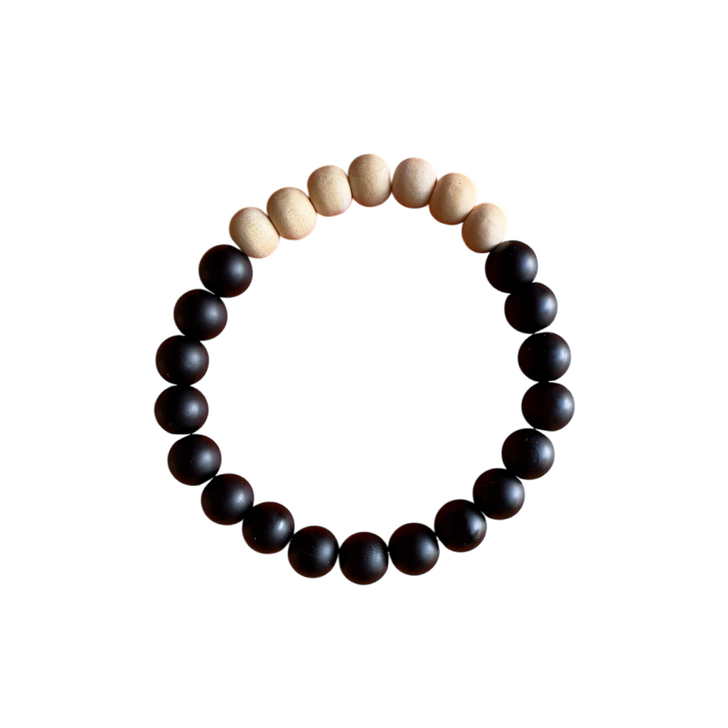 Infused with intention, this bracelet doubles as an essential oil diffuser—simply add a drop of your favorite essential oil to the porous beads to enjoy the benefits of aromatherapy throughout the day. Whether you seek stress relief, emotional balance, or a moment of peace, this bracelet serves as a gentle reminder to take life one step at a time.

Perfect for daily wear, meditation, or as a thoughtful gift, the One Day at a Time Diffuser Bracelet is a stylish and meaningful addition to any wellness routine