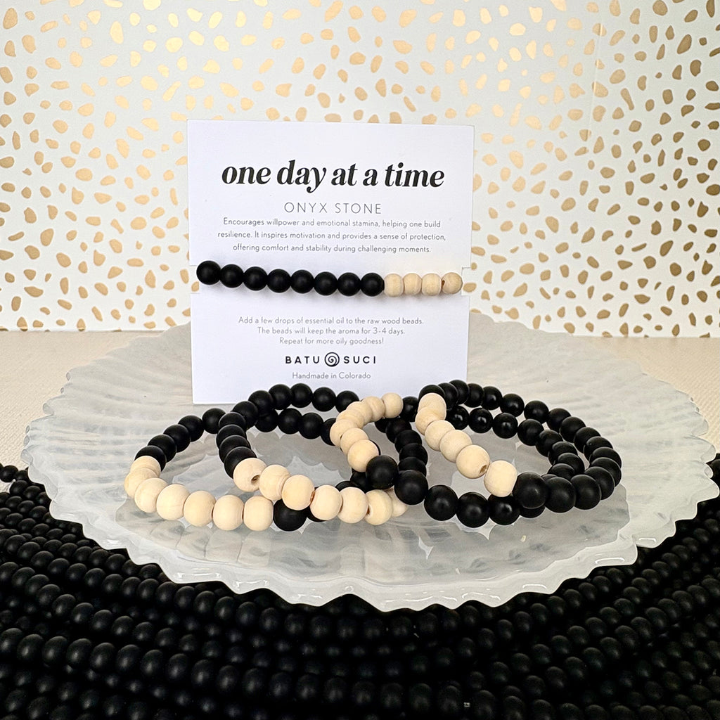 Infused with intention, this bracelet doubles as an essential oil diffuser—simply add a drop of your favorite essential oil to the porous beads to enjoy the benefits of aromatherapy throughout the day. Whether you seek stress relief, emotional balance, or a moment of peace, this bracelet serves as a gentle reminder to take life one step at a time.

Perfect for daily wear, meditation, or as a thoughtful gift, the One Day at a Time Diffuser Bracelet is a stylish and meaningful addition to any wellness routine