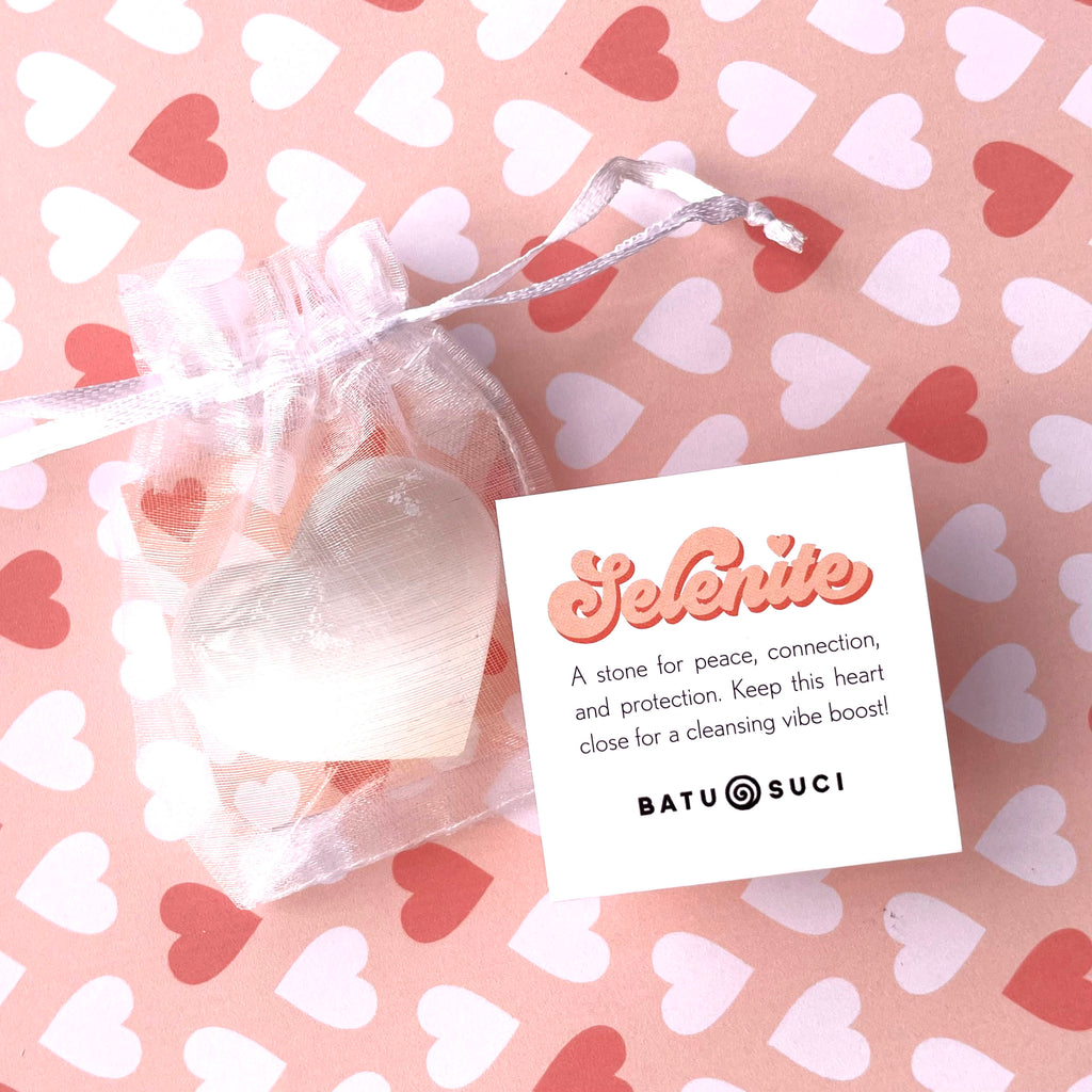 A small selenite crystal heart perfect for gift giving. Packaged with a cute informational card with hearts.